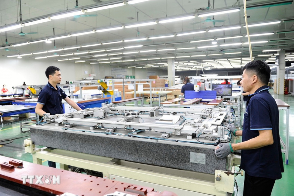 Workers at a South Korean-invested enterprise in Vietnam.
(Photo: VNA)