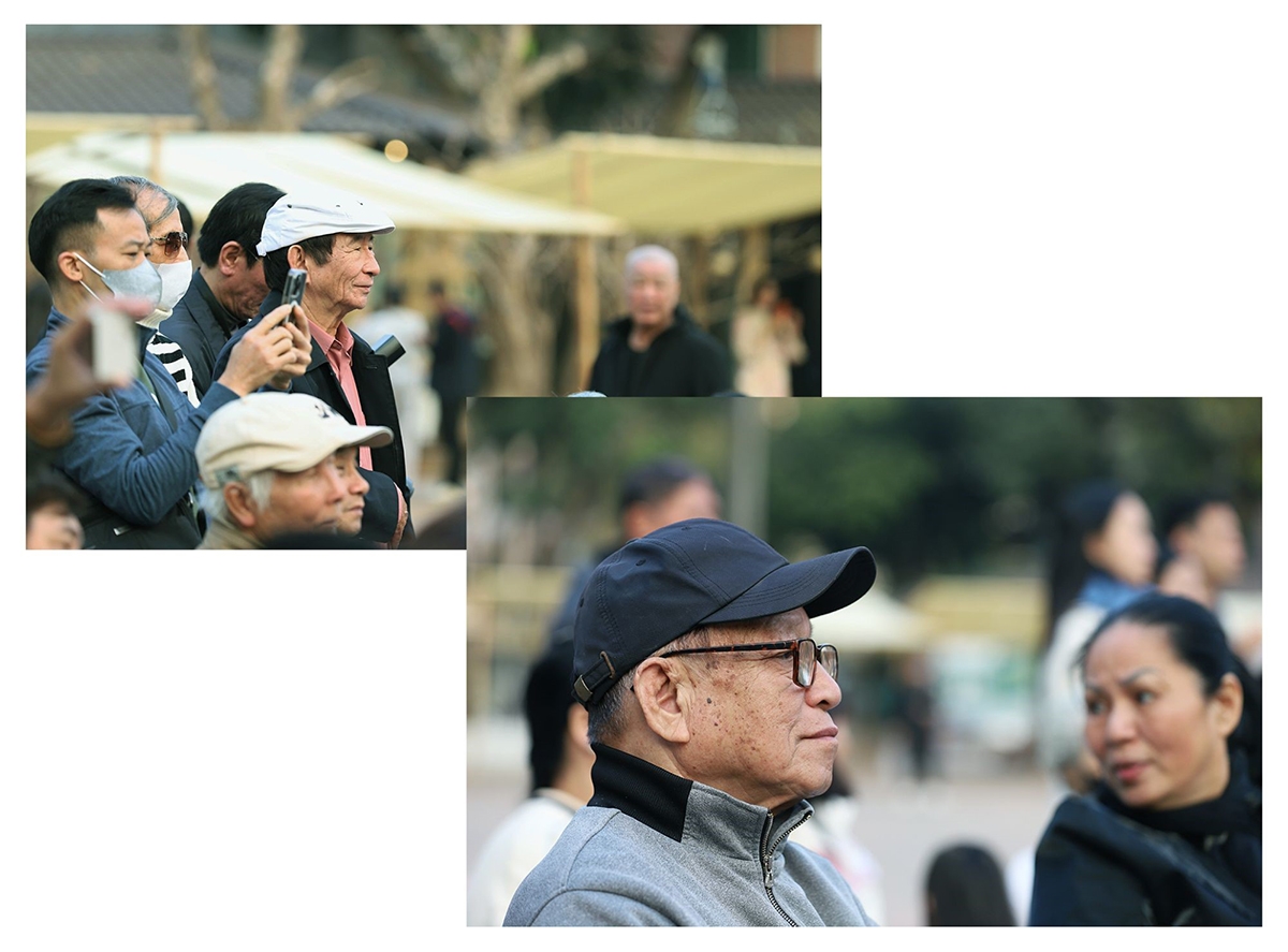 Das Publikum verfolgt das Programm aufmerksam. Viele Zuschauer halten diese Momente mit Handys fest.