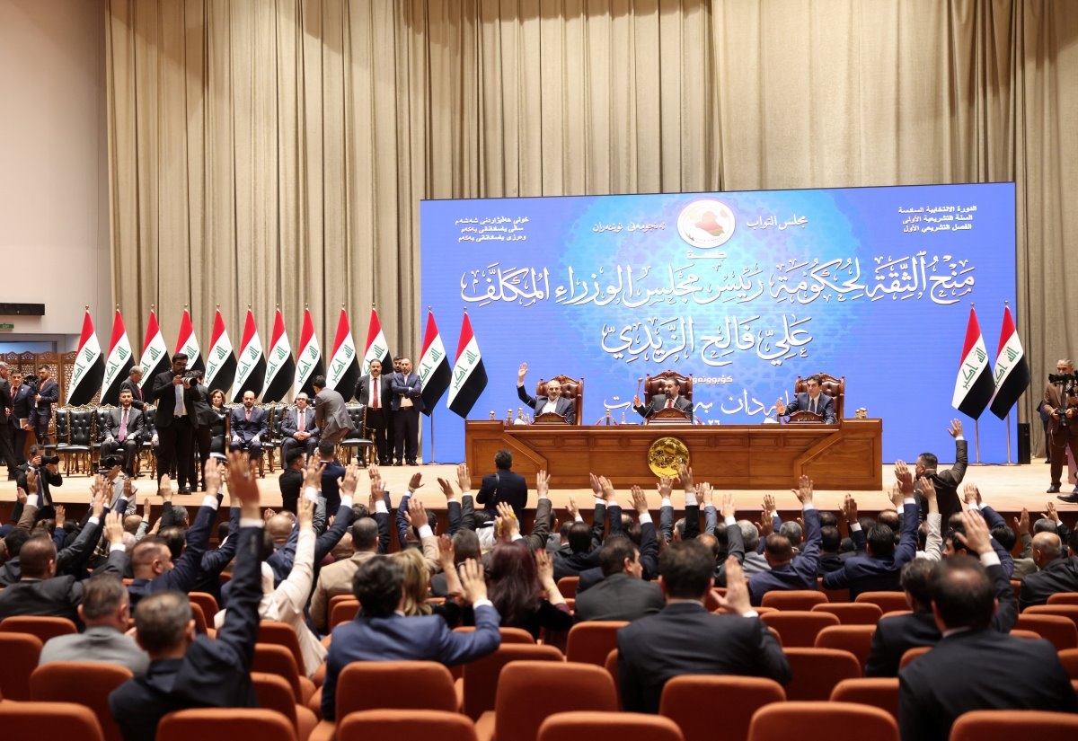 Iraqi lawmakers attend a parliamentary session to vote in a new government headed by Ali al-Zaidi as prime minister, at the parliament headquarters in Baghdad, Iraq, May 14, 2026. Photo: REUTERS/Ahmed Saad