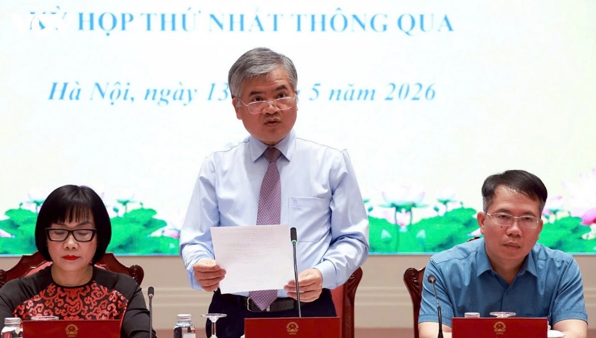 Phó Chủ nhiệm Văn phòng Chủ tịch nước Cấn Đình Tài cồng bố Lệnh của Chủ tịch nước. Ảnh: VOV