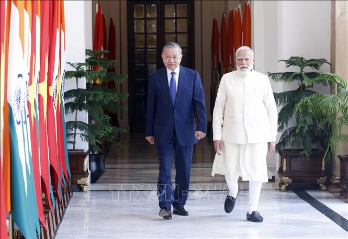 Tổng Bí thư, Chủ tịch nước Tô Lâm và Thủ tướng Ấn Độ Narendra Modi gặp hẹp. Ảnh: Thống Nhất/TTXVN