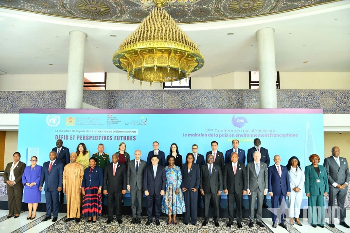 Les chefs de délégation posent pour une photo de famille. Photo: QĐND