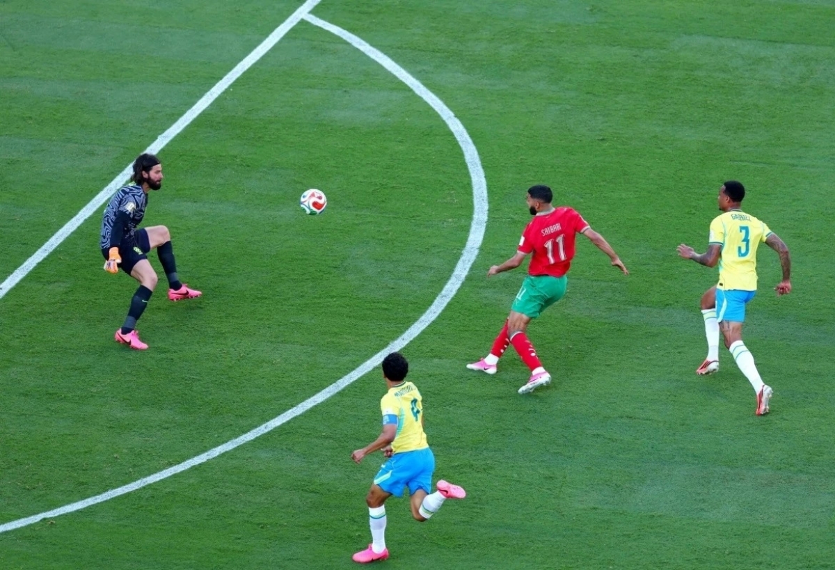Saibari (in red) chips the ball over the goalkeeper to score for Morocco at MetLife Stadium in East Rutherford, New Jersey, the US, on June 13, 2026. (Photo: Reuters)