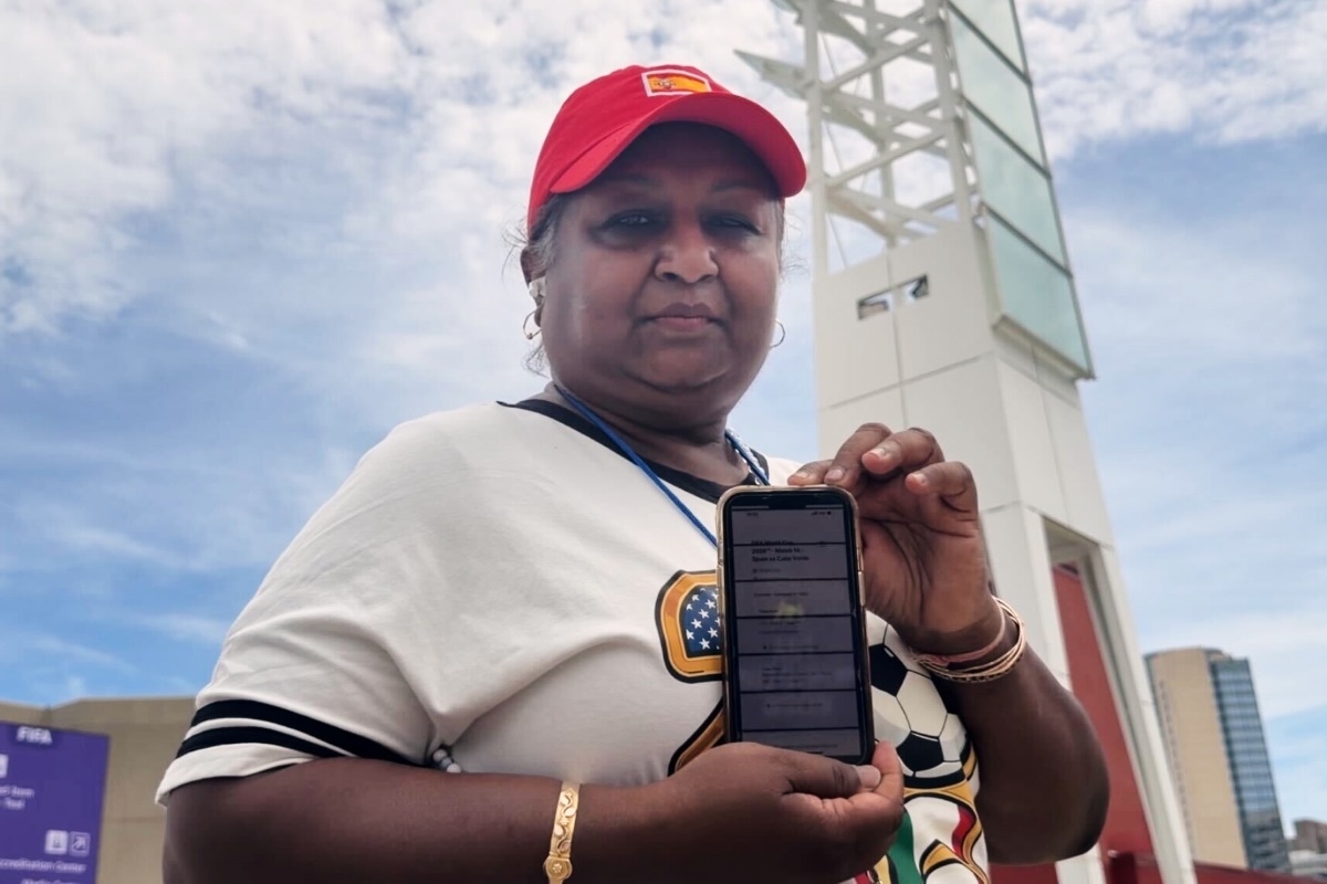 Football fan Bina Ramroop holds proof of the ticket she bought through StubHub for the World Cup Group H soccer match between Spain and Cape Verde in Atlanta on Monday, June 15, 2026. (Photo: AP/Emilie Megnien)