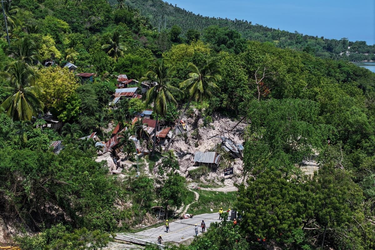 A drone shot shows a landslide following the magnitude 7.8 quake, in Barangay Kapatan, Glan, Sarangani province, southern Philippines, June 10, 2026. (REUTERS/Adrian Portugal)