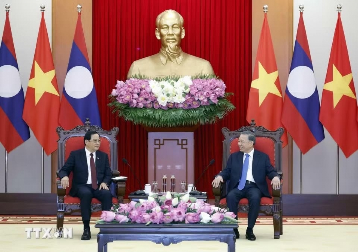 ラオス首相との会見　写真:TTXVN