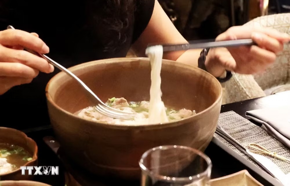 Pho, Vietnam’s iconic rice noodle soup, is a favorite among international visitors. (Photo: Hong Dat/VNA)