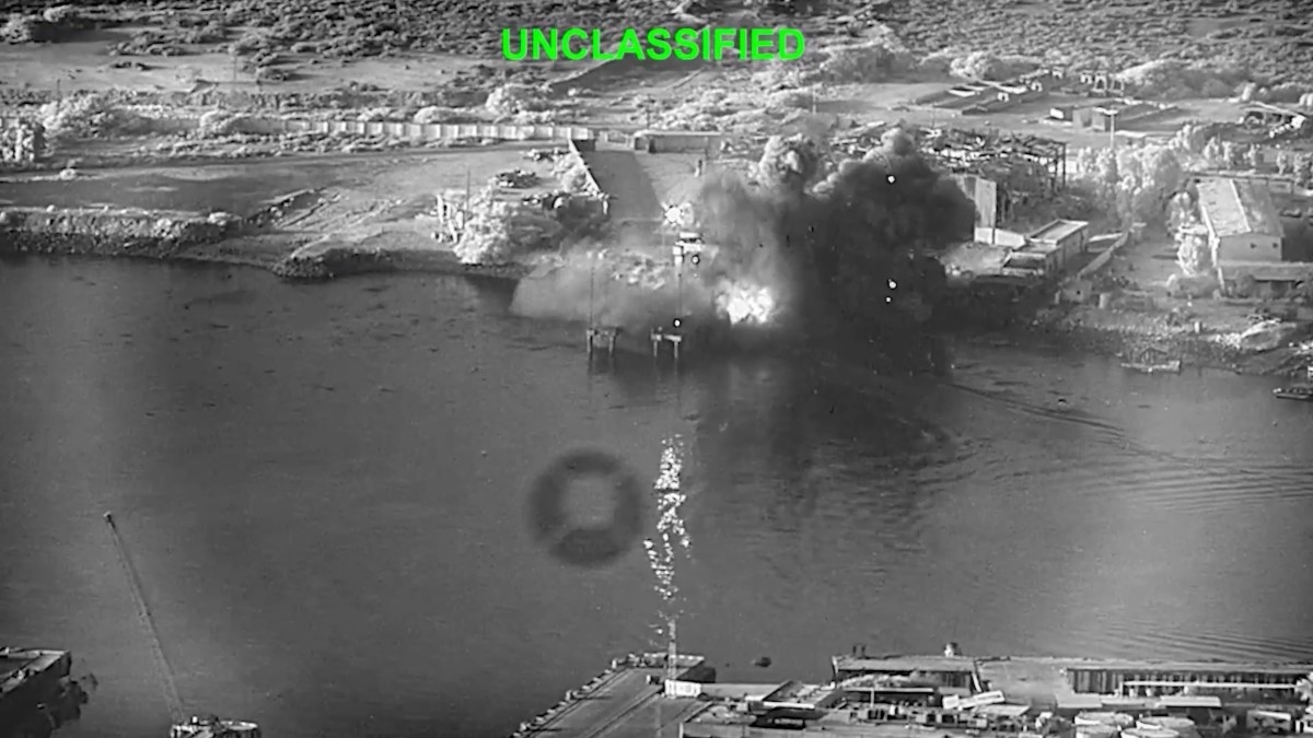 This image from video shows an explosion at Bandar Abbas Naval Base, Iran, as three Corsair unmanned surface vessels, also called one-way attack surface drones, fired by the US military, hit the port July 12, 2026. Photo: US Central Command via AP