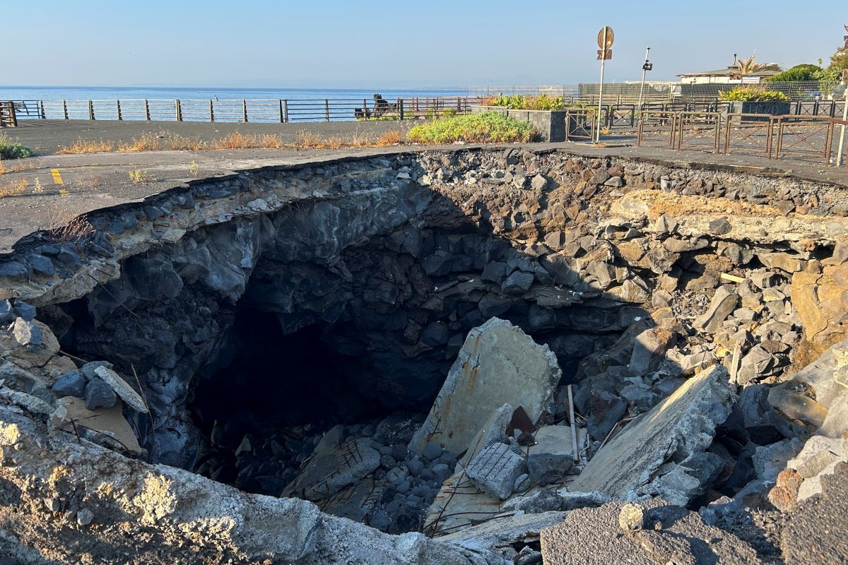 A sinkhole carved out by Cyclone Harry is visible along the seafront of Catania, Italy, June 28, 2026. (Photo: REUTERS/Giselda Vagnoni)