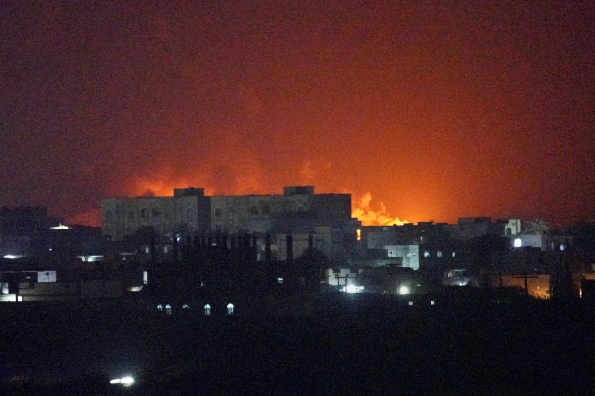 Flames and smoke rise from the port of Mokha during a strike in Yemen, Friday, on August 14, 2026. (Photo: AP/Abdulnasser Alseddik)