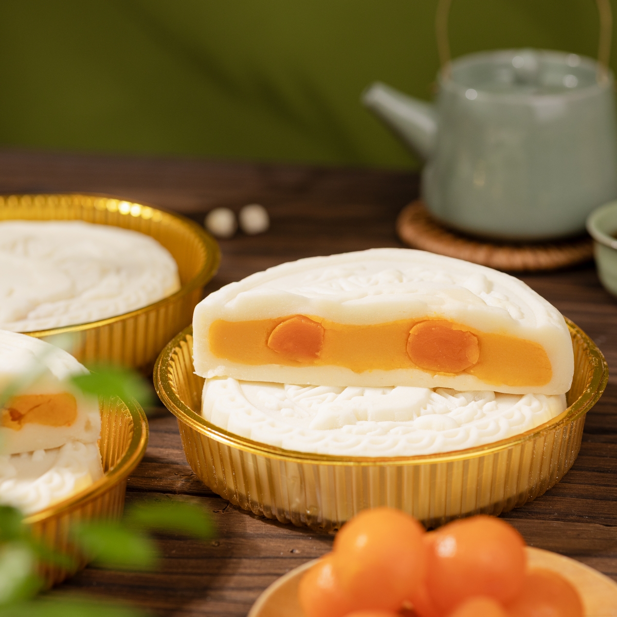 While the ingredients are all familiar in a traditional mooncake, the combination of four salted egg yolks gives this version a richer texture and a more striking appearance. (Photo: Savor Cake)