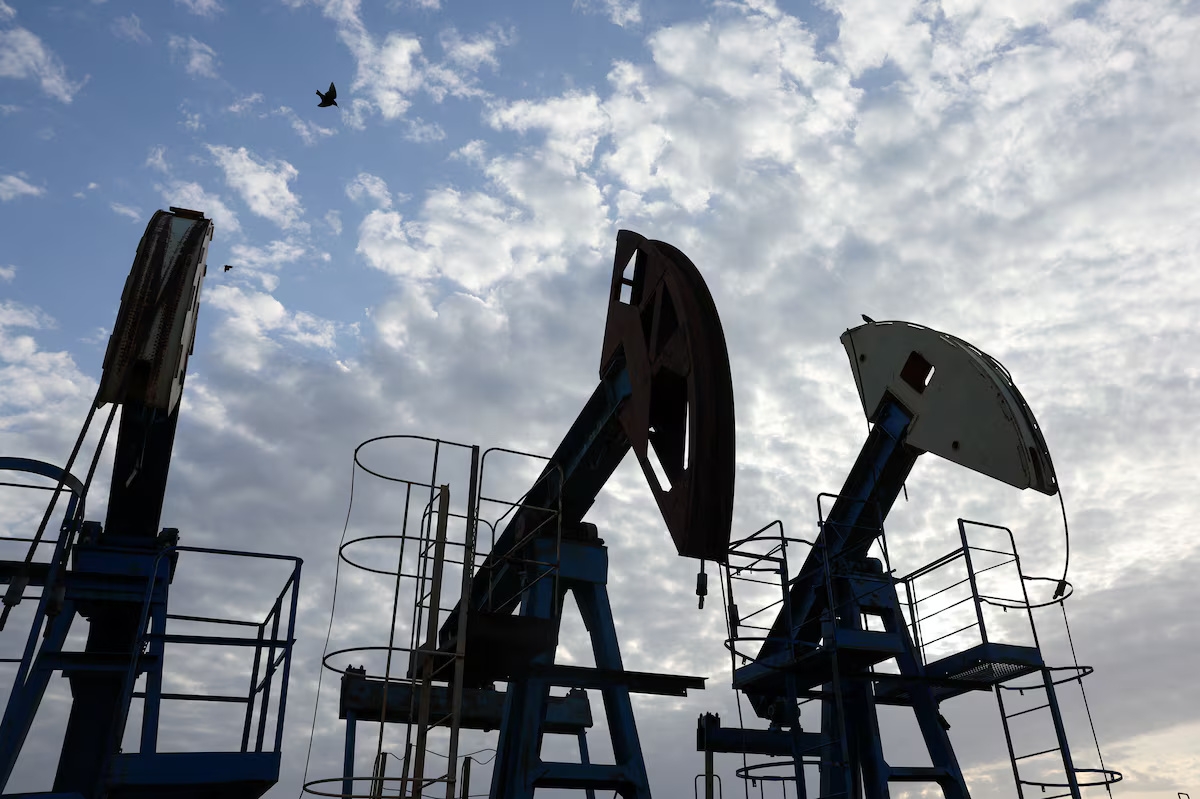 Birds fly over pump jacks at the Airankol oil field operated by Caspiy Neft in the Atyrau region, Kazakhstan, on April 20, 2026. (Photo: Reuters/Pavel Mikheyev)