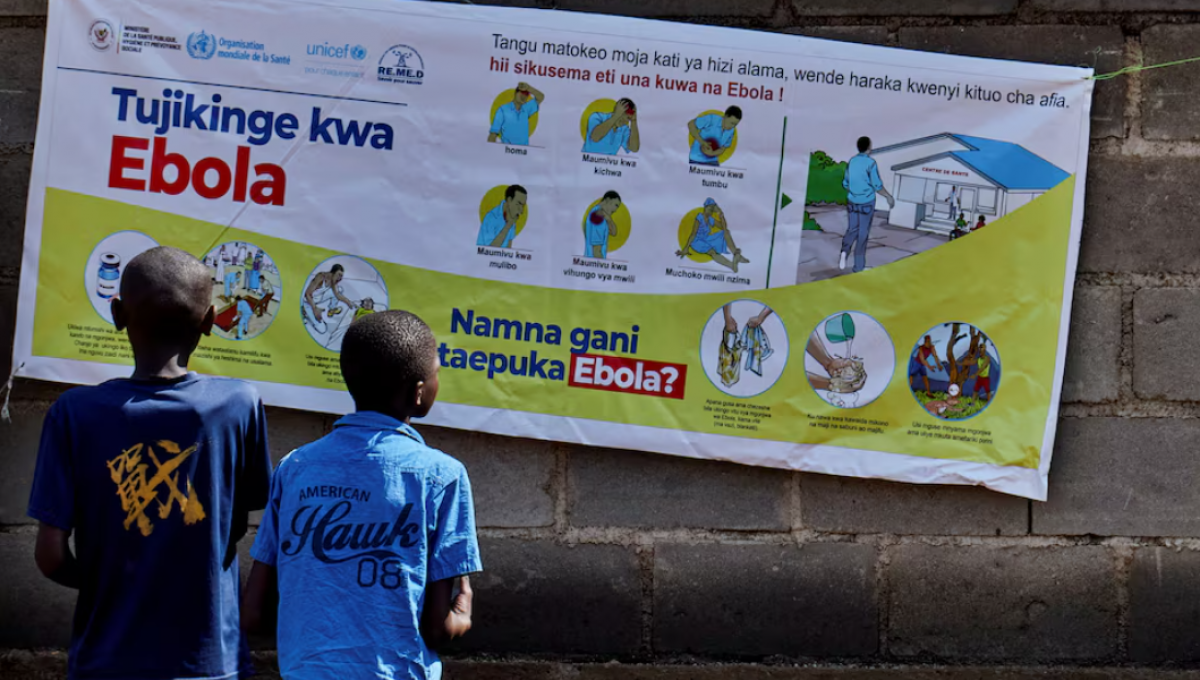 Congolese children read an advocacy poster as aid agencies intensify efforts to contain a new Ebola outbreak involving the Bundibugyo strain outbreak, in Bunia, Ituri province, Democratic Republic of Congo, on May 20, 2026. (Photo: REUTERS)