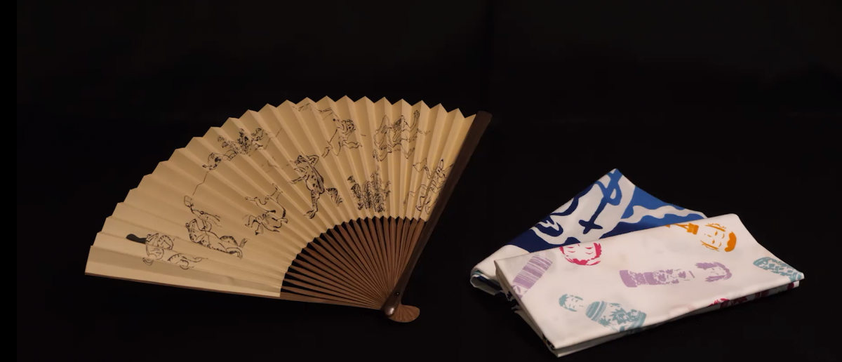 Sensu (folding fan) and a Tenugui (a small hand towel) are used as props in rakugo storytelling. (Photo: Embassy of Japan)