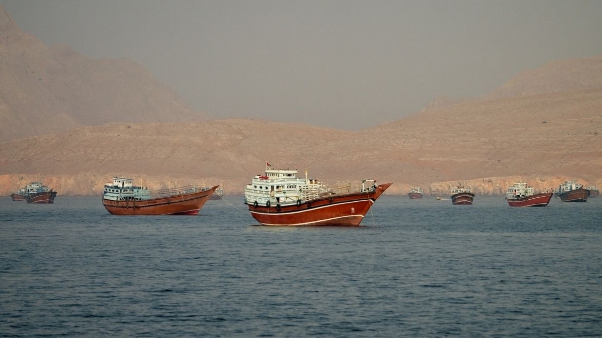 Vessels sail through the Strait of Hormuz, as seen from the Musandam Peninsula in Oman. (Photo: Reuters)