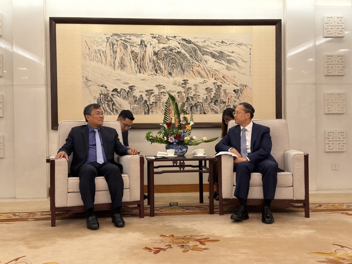 Thứ trưởng Thường trực Bộ Ngoại giao Nguyễn Minh Vũ làm việc với Thứ trưởng Thường trực Bộ Ngoại giao Trung Quốc Mã Triều Húc. Ảnh: Bảo Chi/Báo Quốc tế