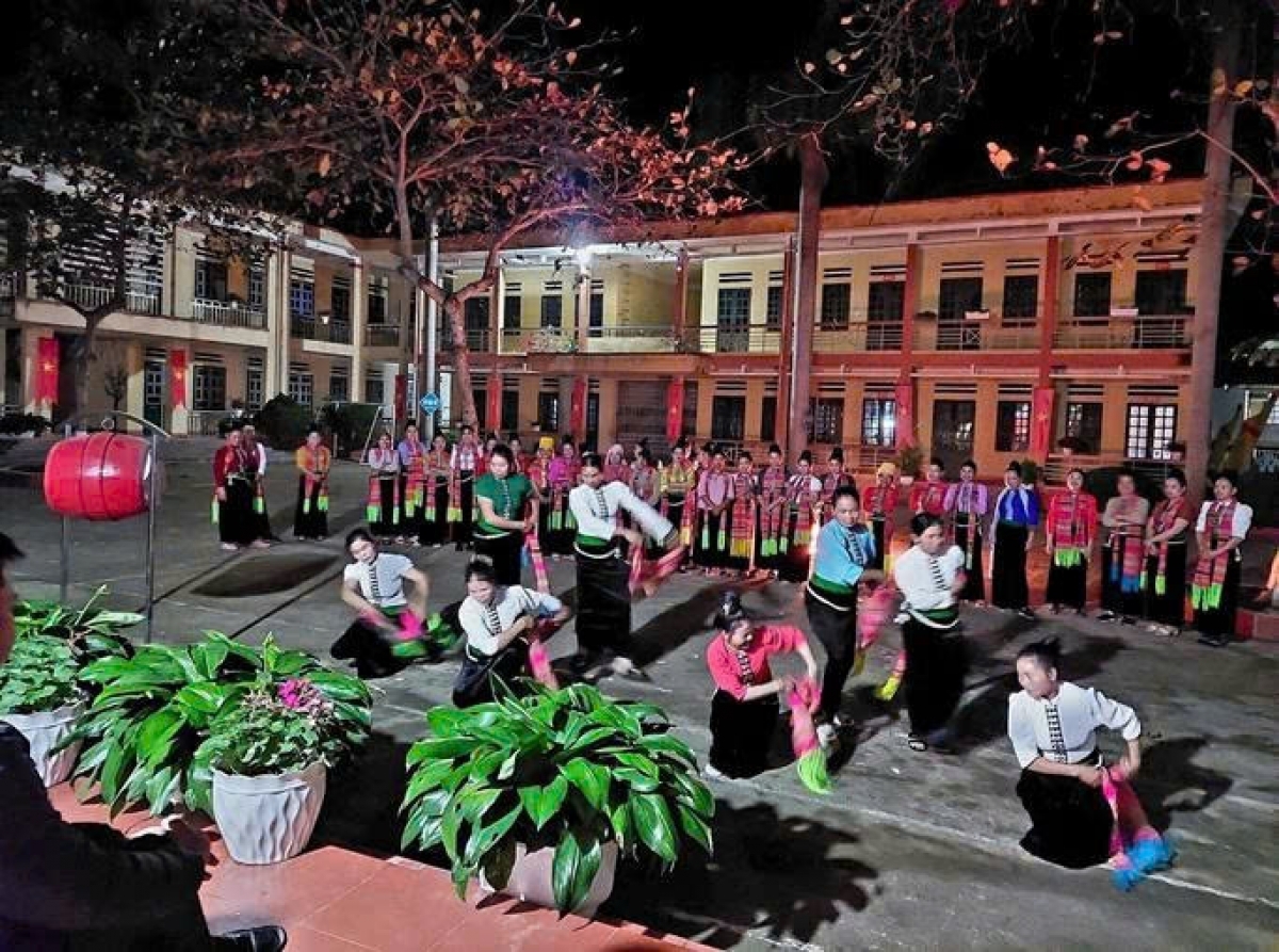 Learning, reading books, and dancing together, the class has become part of community life.