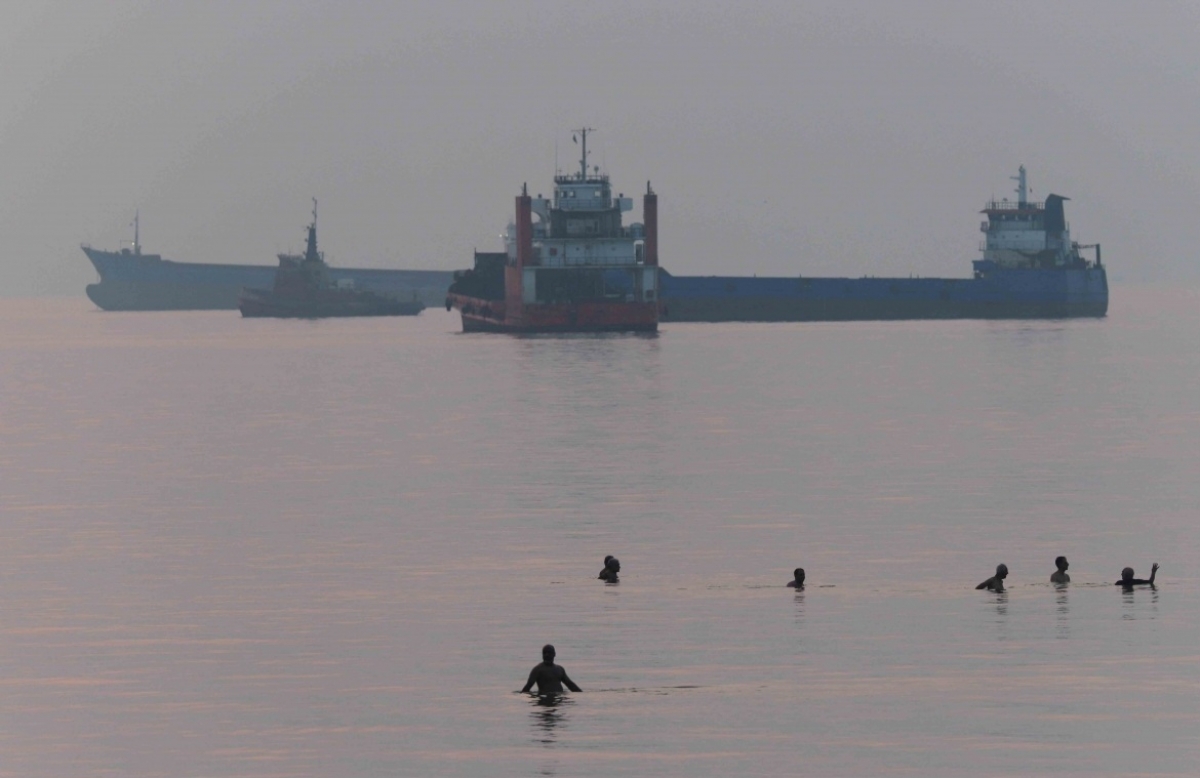 A cargo ship passes through the Strait of Hormuz. (Photo: Reuters)