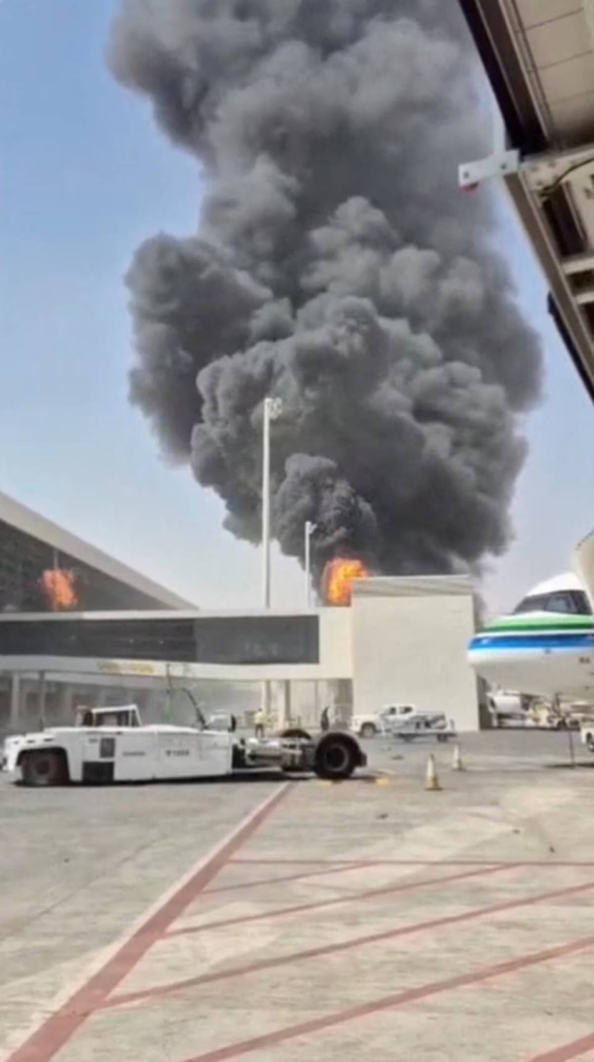 Smoke and flames rise from King Khalid Airport, after Yemen’s Iran-Houthis said they attacked the airport, in Riyadh, Saudi Arabia, October 8, 2026, in this screengrab obtained from a social media video. (Social Media/via REUTERS)