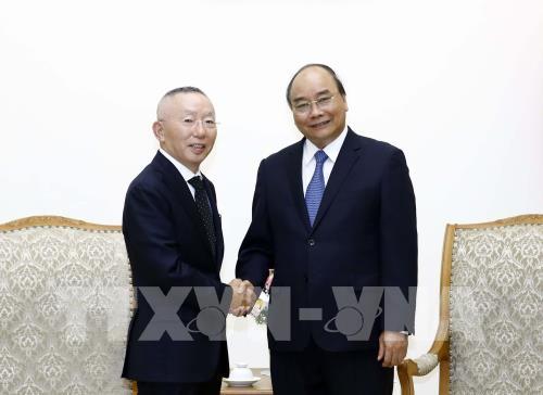 ທ່ານນາຍົກລັດຖະມົນຕີຫວຽດນາມຫງວຽນຊັວນຟຸກໃຫ້ການຕ້ອນຮັບກຸ່ມບໍລິສັດ Fast Retailing ປະເທດຍີ່ປຸ່ນ