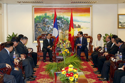 PM Vietnam Nguyen Tan Dung menerima PM Laos Thongsing Thammavong