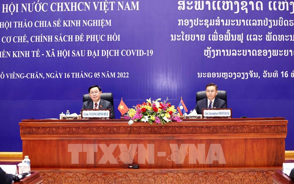 Vietnam und Laos teilen Erfahrungen in sozioökonomischer Entwicklung nach Covid-19-Pandemie