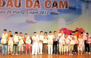 Программа под названием «Мы рядом с жертвами эйджент орандж» в городе Дананге