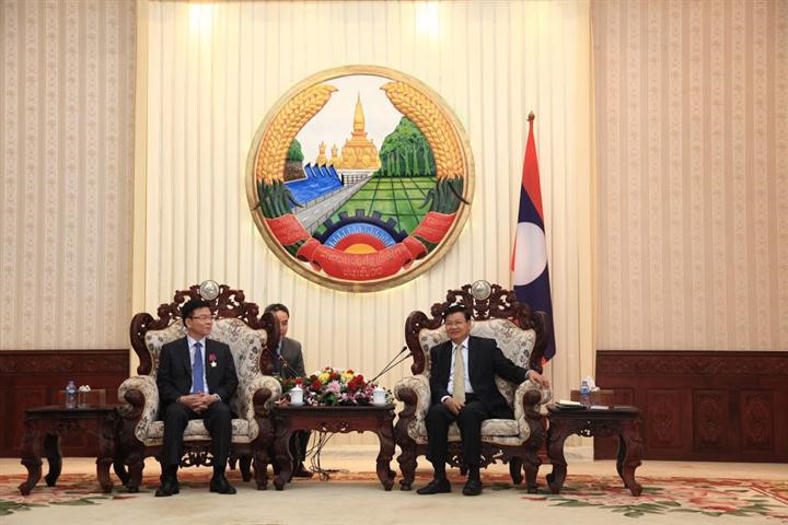 Vietnam y Laos se apoyan mutuamente en el sector jurídico