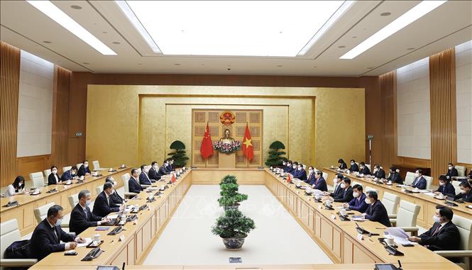 Premierminister Pham Minh Chinh empfängt den chinesischen Außenminister Wang Yi