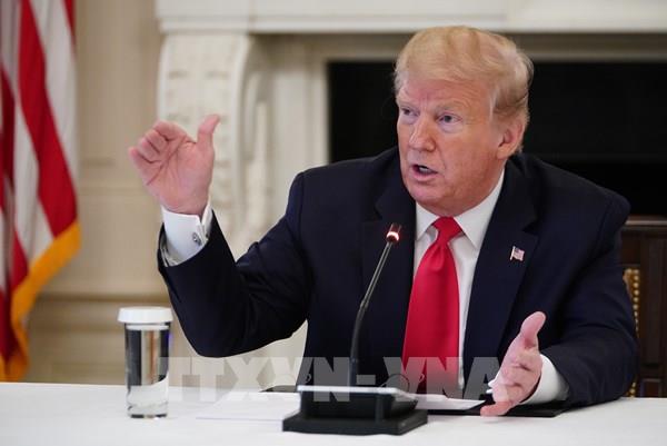 ປະທານາທິບໍດີອາເມລິກາ Donald Trump ນາບຂູ່ຈະຈັດວາງພາສີບັງຄັບໃຫ້ບັນດາບໍລິສັດອາເມລິກາ ກັບເມືອປະເທດ