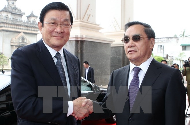 Лаосские СМИ освещают визит президента СРВ Чыонг Тан Шанг в Лаос