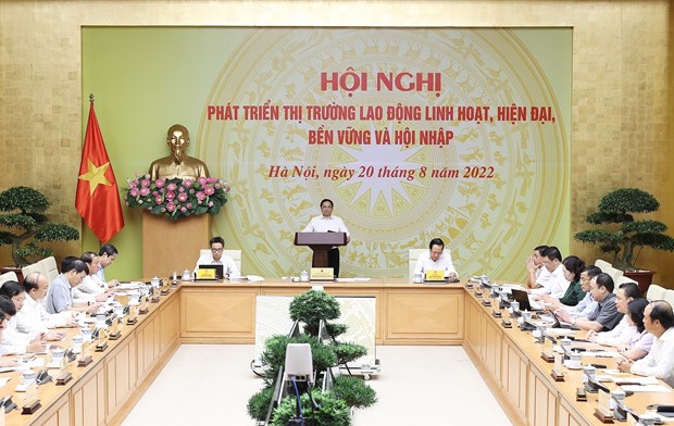 Premierminister Pham Minh Chinh leitet die Konferenz zur Entwicklung des Arbeitsmarktes