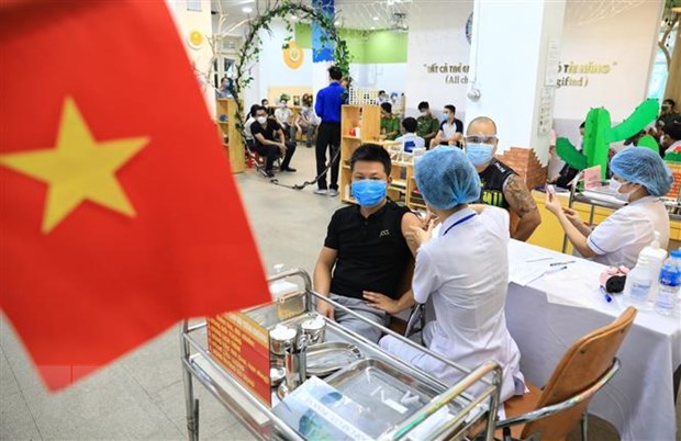 Junge Welt schreibt über Massenimpfung in Hanoi