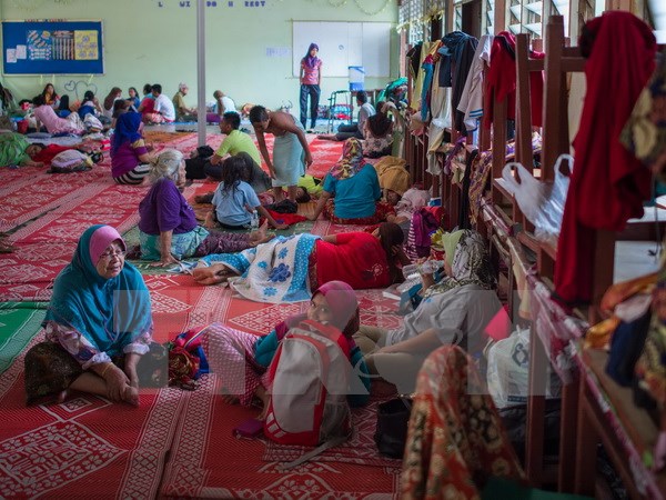 รัฐบาลมาเลเซียพยายามช่วยเหลือประชาชนที่ประสบเหตุนํ้าท่วม