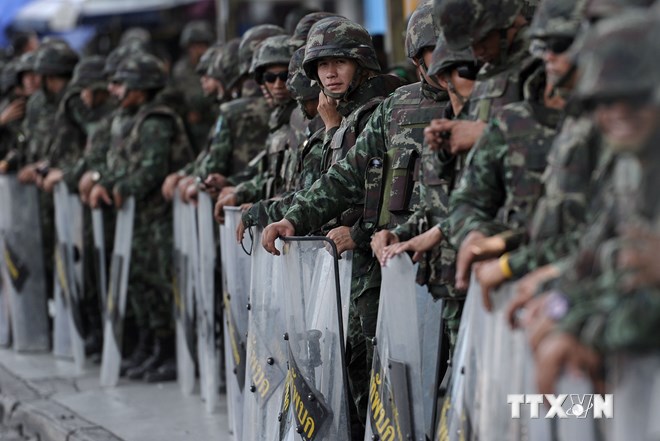 ໄທຜັນຂະຫຍາຍທະຫານ ແລະຕຳຫຼວດສະກັດ ກັ້ນການແຫ່ຂະບວນ ປະທ້ວງ