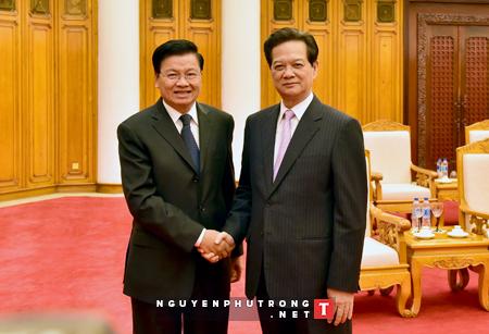 ບັນດາການນຳພັກ,ລັດ,ລັດຖະບານຫວຽດນາມຕ້ອນຮັບຄະນະຜູ້ແທນຂັ້ນສູງຄະນະພົວພັນຕ່າງປະເທດສູນກາງພັກປຊຊປະຕິວັດລາວ