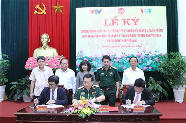 ພິທີລົງນາມໂຄງການສົມທົບກັນໂຄສະນາກ່ຽວກັບໜ້າທີ່ການທະຫານ,ປ້ອງກັນຊາດ